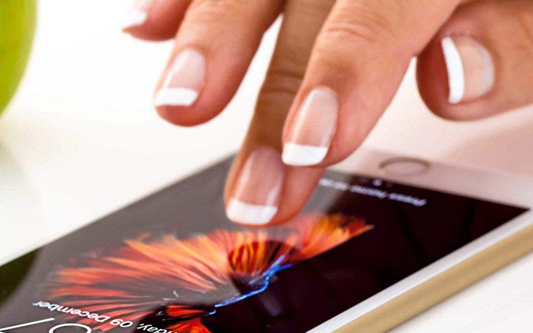 Image of a lady's finger about to tap a smartphone